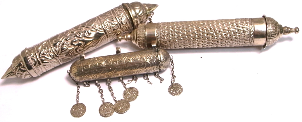 Two white metal scroll cases heavily engraved and a châtelain with silver coin decoration,