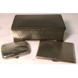 A pewter jewellery box, a George V hallmarked silver engine turned cigarette case, Birmingham 1913,