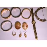 A quantity of yellow metal, silver and white metal to include yellow metal framed cameo brooches,