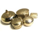 Five white metal trinket pots,