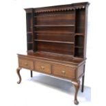 A late 19th early 20th century oak dresser,