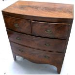 A Georgian mahogany bow front two over three chest of drawers raised on bracket feet, width 80cm.