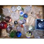 A collection of glass to include glass paperweights and moulded glass figures,