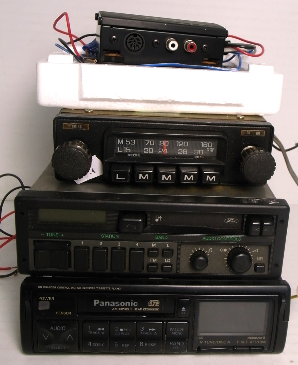 Four car radios to include two Panasonic, one Ford and one other (4).