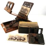 A Victorian stereoscope and a quantity of stereo photographs.