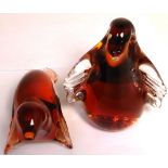 Two pieces of Wedgwood amber colour glass models, one of a seal and one of a penguin (2).