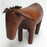 OMERSA; a vintage stitched leather stool in the form of a donkey, length 66cm. CONDITION REPORT: