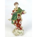 An 18th century Derby figure of Justice, her robe with hand painted floral motifs, raised on foliate