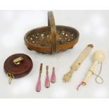 An early 20th century crocodile skin travelling case containing a toothbrush,