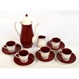 A Susie Cooper red polka dot on white ground coffee set (af).