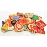 An extensive collection of various cardboard beer mats, approximately 800 mats.