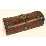 A Victorian walnut and Gothic brass mounted stud decorated domed trinket box, width 29cm.
