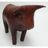 OMERSA; a vintage stitched leather stool in the form of a bull, length 58cm. CONDITION REPORT:
