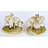 A pair of late 19th century Staffordshire figure groups depicting a milk maid and a boy with cows,