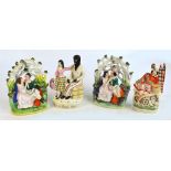 Four late 19th century Staffordshire figure groups, on inscribed to the base "Eva and Uncle Tom",