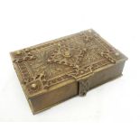 A Victorian novelty brass trinket box in the form of an elaborately decorated book with thistle