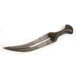 A 20th century Jambiya dagger with horn handle set with metal studs to one side, length 29cm,