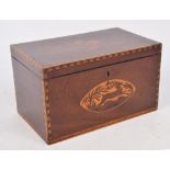 A late George III mahogany and inlaid tea caddy with decorated edges and centred with a running stag