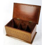 An Edwardian parquetry inlaid hinged rectangular box with sectioned interior, width 33cm.