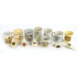 A collection of ceramics relating to military and royal commemoratives, including mugs,