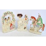 Three large late 19th century Staffordshire figure groups, one depicting a man seated upon a