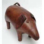 OMERSA; a vintage stitched leather stool in the form of a pig, length 63cm. CONDITION REPORT: Tail