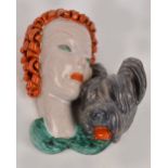 GOLDSCHEIDER; an Art Deco wall mask depicting a red haired lady and a dog, marked and impressed no.