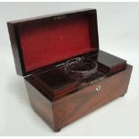 An early Victorian rosewood tea caddy of sarcophagus form, with central glass section (cover