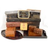 A collection of boxes and trays including two metal document boxes, a first aid box,