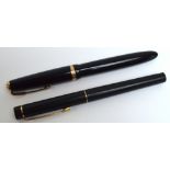 A Parker Maxima Duofold fountain pen with black body, also a Sheaffer fountain pen (2).