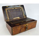 A Victorian walnut brass bound writing slope centred with a shaped brass vacant cartouche, and