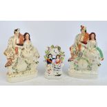 Three late 19th century Staffordshire flatback clock groups, each depicting a couple with a clock,