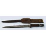A WWI saw back bayonet, the blade stamped "Erfurt", with metal scabbard and leather belt attachment,