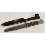 A WWII Nazi Hitler Youth dagger with enamelled emblem to the grip and metal scabbard, length 25cm.
