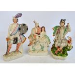 Three large late 19th century Staffordshire figures; one depicting "Wallace", a flatback clock