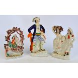 Two late 19th century Staffordshire figure groups depicting couples, one inscribed to the base "