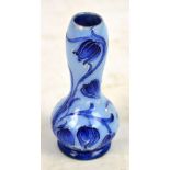 A MacIntyre Moorcroft miniature blue tubelined gourd vase with red stamp to base and green Moorcroft