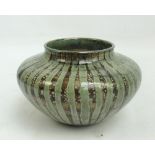 A Cobridge stoneware brown ground and green dip vase of squat baluster form, by Anita Harris, 2002,