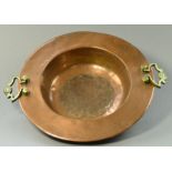 A copper dish with brass side handles, diameter 48cm.
 CONDITION REPORT: Appears good with no