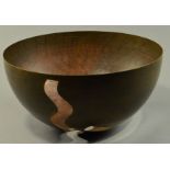 ALEX BROGDEN (born 1954); a large pierced copper bowl, diameter 42cm.

 CONDITION REPORT: