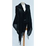 ISSEY MIYAKE (born 1938); a black stole, 165 x 58cm.

Provenance: Purchased from Pollyanna,