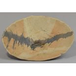 SUTTON TAYLOR (born 1943); an early hand built stoneware bowl, extremely thin walled, undulating