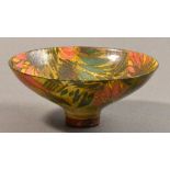 SUTTON TAYLOR (born 1943); an earthenware footed bowl, leaf patterned lustre decoration in pink