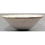 DAVID ROBERTS (born 1947); a large coil built raku bowl, white crackle glaze with unglazed feathered