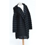 ISSEY MIYAKE (born 1938); a black pleated jacket, length 88cm.

Provenance: Purchased from