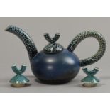 WALTER KEELER (born 1942); a salt glazed teapot (with two spare lids), blue finish, impressed