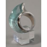 CHARLOTTE DE SYLLAS (born 1946); a fish ring, 18ct white gold and carved aquamarine crystal,