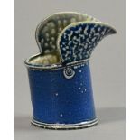 WALTER KEELER (born 1942); a small salt glazed jug with flared mouth, blue finish, impressed mark,