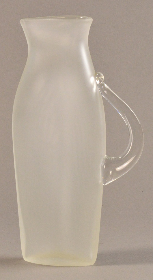 STEVEN NEWELL (born 1948); a tall flat opaque glass jug, incised signature, height 29cm.