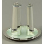 REBECCA DE QUIN (born 1958); a hallmarked silver oil and vinegar set on tray with glass insert,